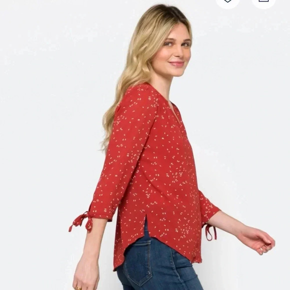 Fun2fun rust colored shirt with a cream colored design size small. - Picture 4 of 11